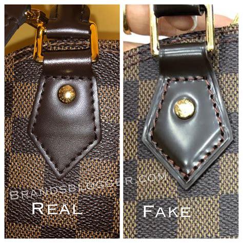 how do you tell fake louis vuitton alma bat|false louis vuitton.